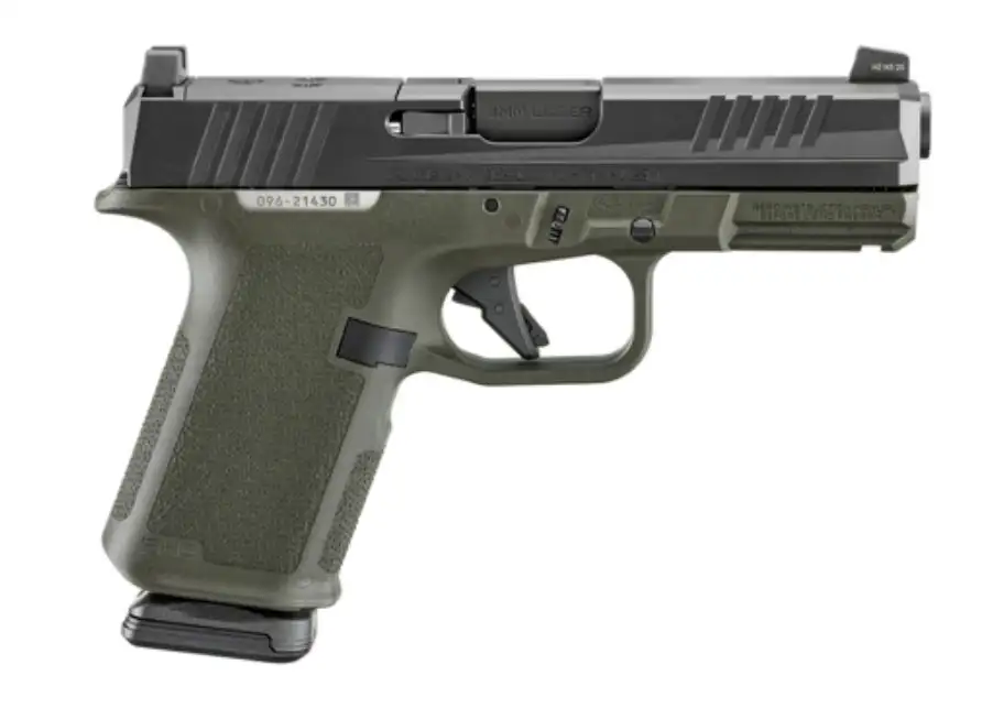Ruger RXM 9mm pistol with 4-inch barrel, black slide, and OD green grip